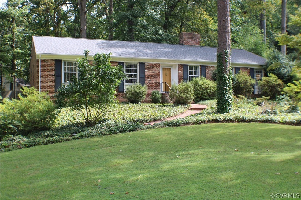 Beautiful, all brick, 4 bedroom ranch with a basement, 2 car garage, brand new roof & garage doors!