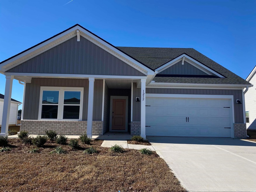 View of front of home featuring covered porch and 
