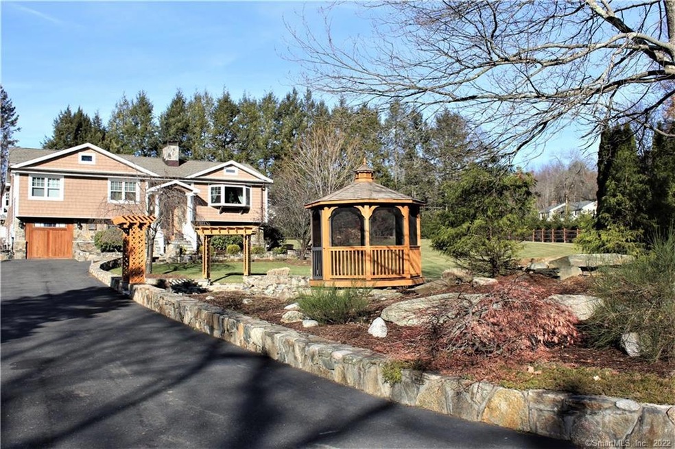 The Stone Wall, Gazebo & Pergola Welcome you Home!