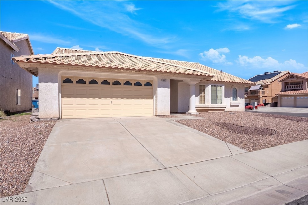 Mediterranean / spanish-style home with driveway,