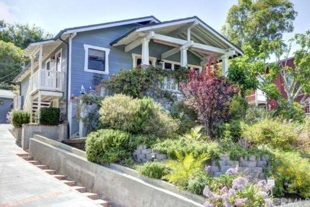 Rebuilt Craftsman, river-rock detail of porch is o