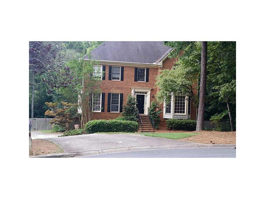 Exterior Front. 3 sides brick in a cul-de-sac next