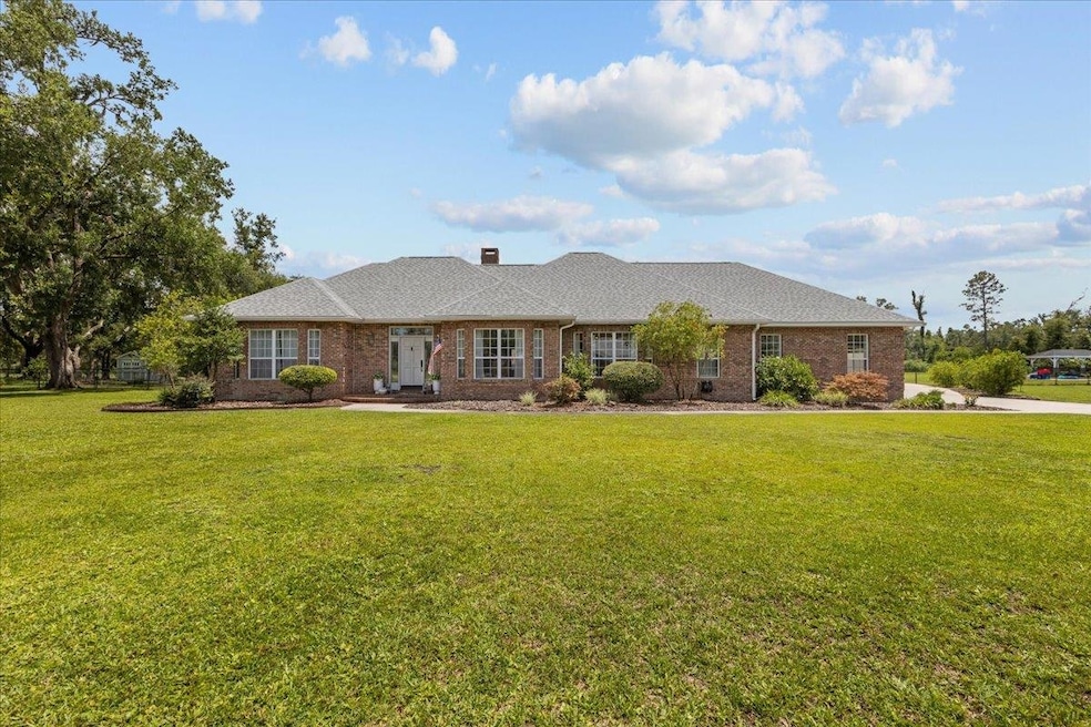 411 Worley Way, Perry, FL 32347 - photo 1