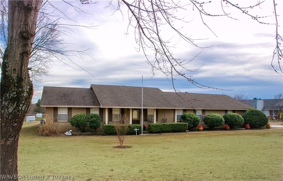 1910 W Shawntel Smith Blvd, Muldrow, OK 74948 - photo 1