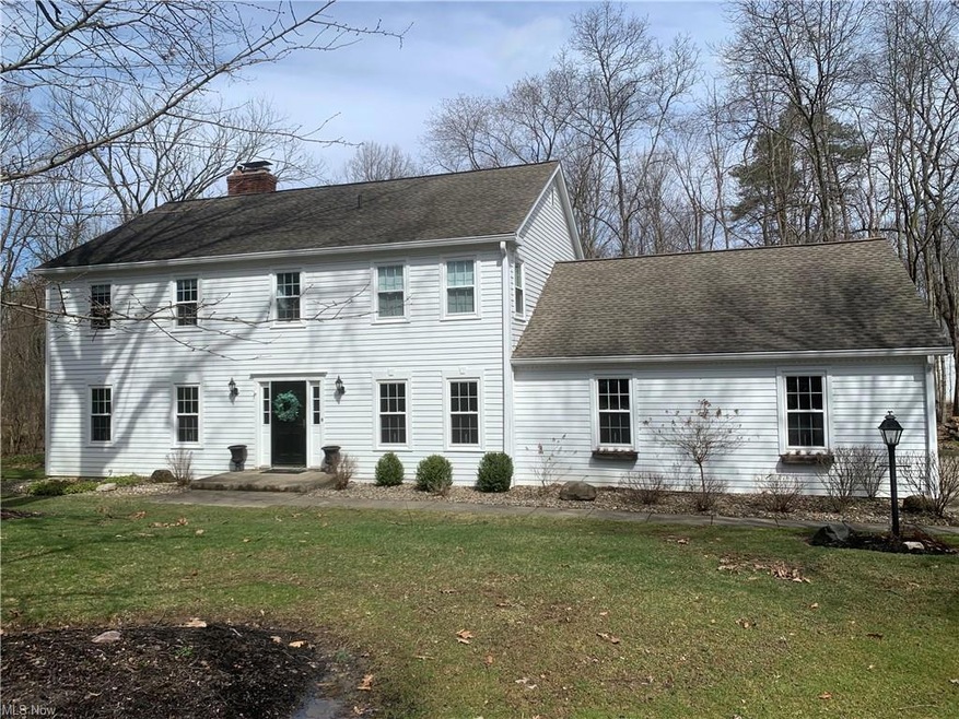 Superb colonial deep set on over 2.5 acres