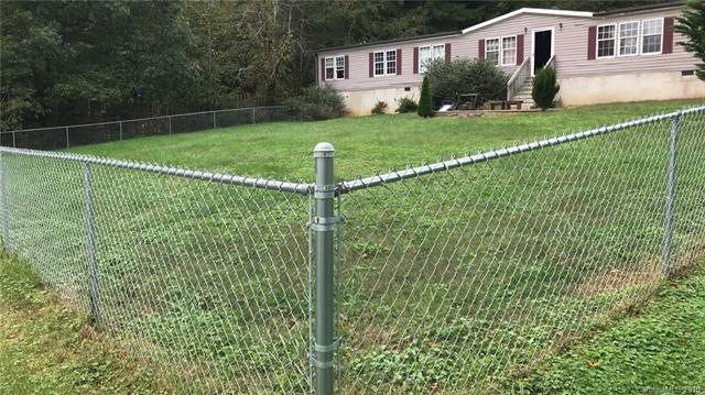 Large fenced in front yard