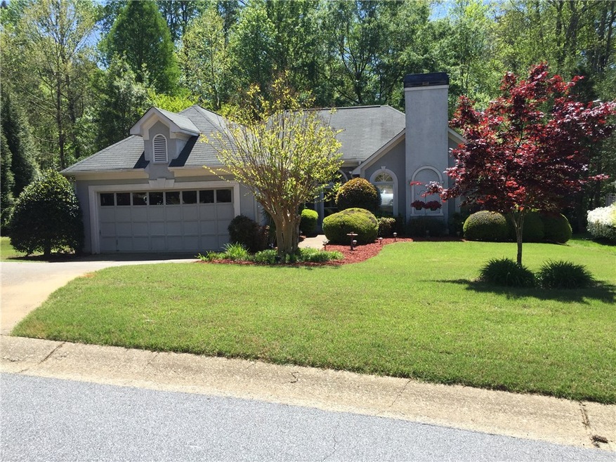 Stepless ranch with private back yard overlooking 