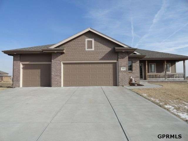 Almost new!  Beautiful wood floors, Granite,  Stainless gas grill and truly a Must See!