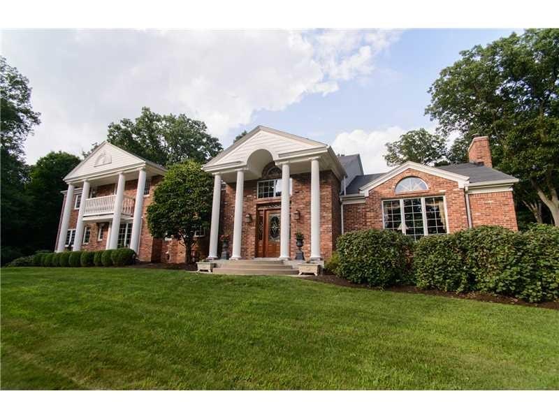 Exterior Front. This stately colonial home is seat