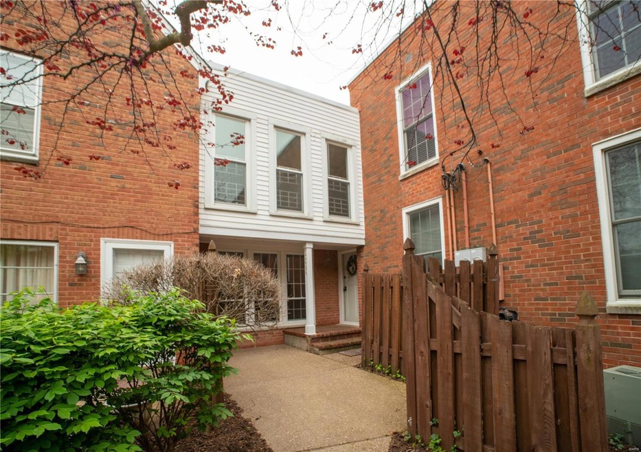 Private courtyard patio welcomes you th this distinctive 2 Story Townhouse