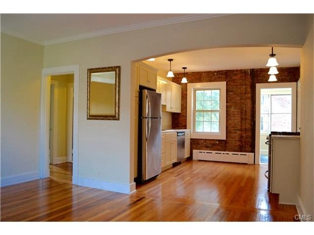 Gorgeous hardwood throughout unit featuring an ope