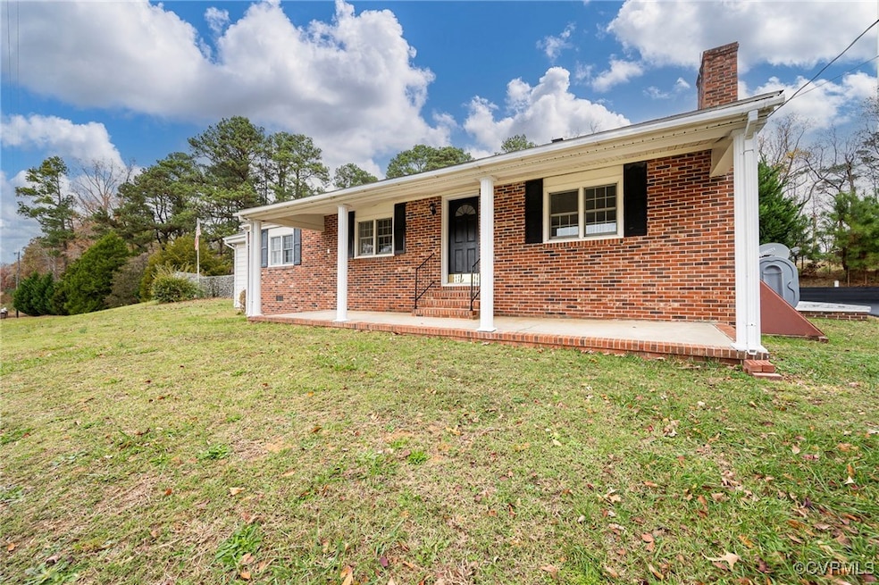 Ranch-style house with a front lawn