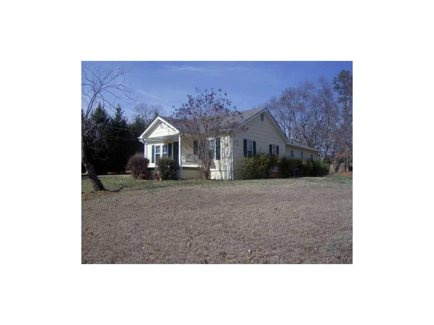 4477 Strickland Rd, Flowery Branch, GA 30542 - photo 1