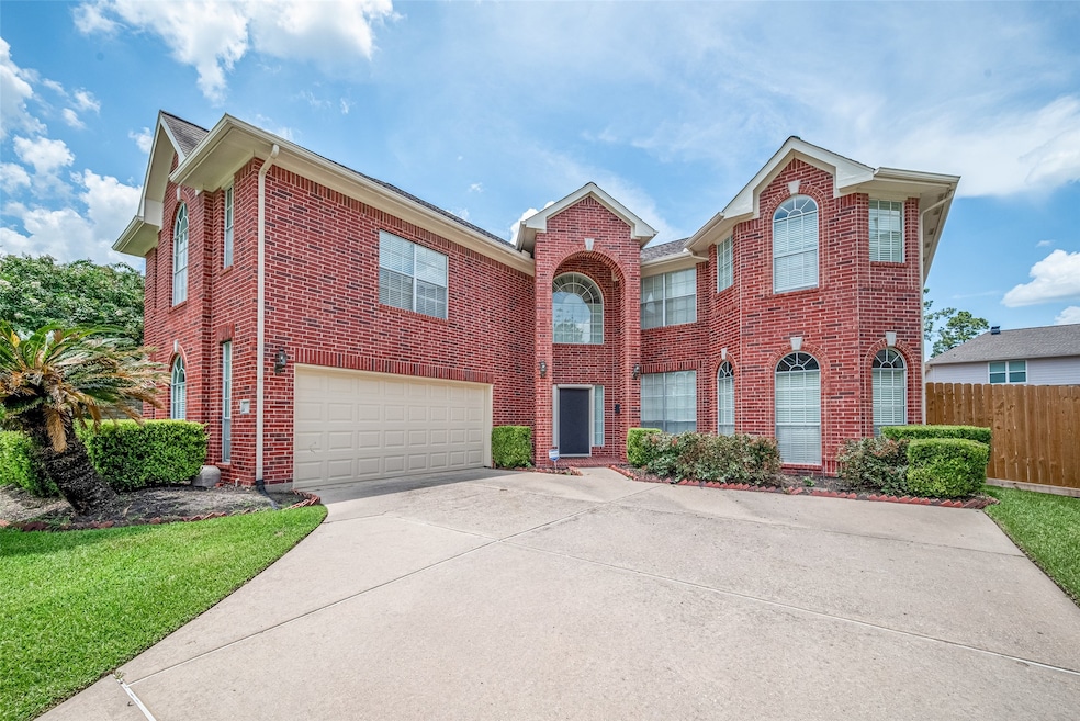 Spacious and elegant  two-story brick home with a