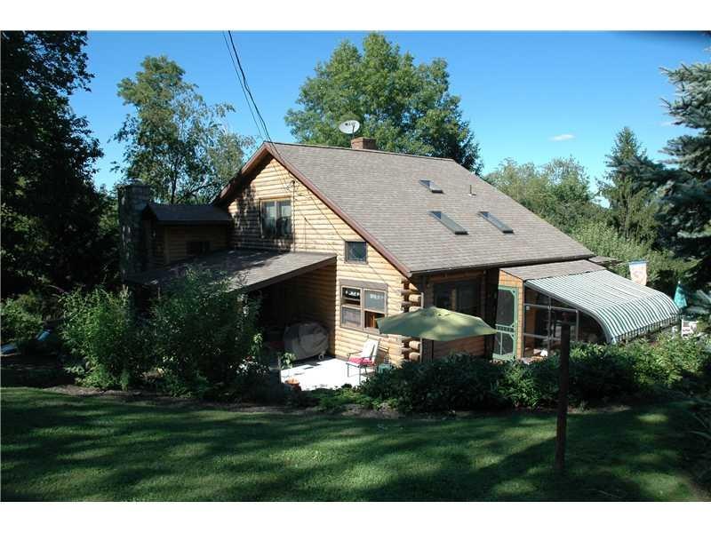 Exterior Front. Beautiful log home with atrium, si