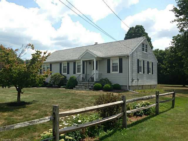 Exterior Front. Professionally landscaped