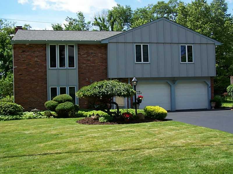 Exterior Front. WELL MANICURED!