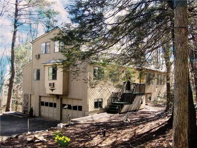 Exterior Front. Lightly wooded lot - almost no mai