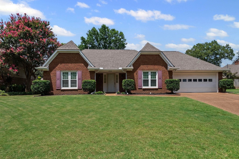Ranch-style home featuring roof with shingles, brick siding, concrete driveway, and an attached garage