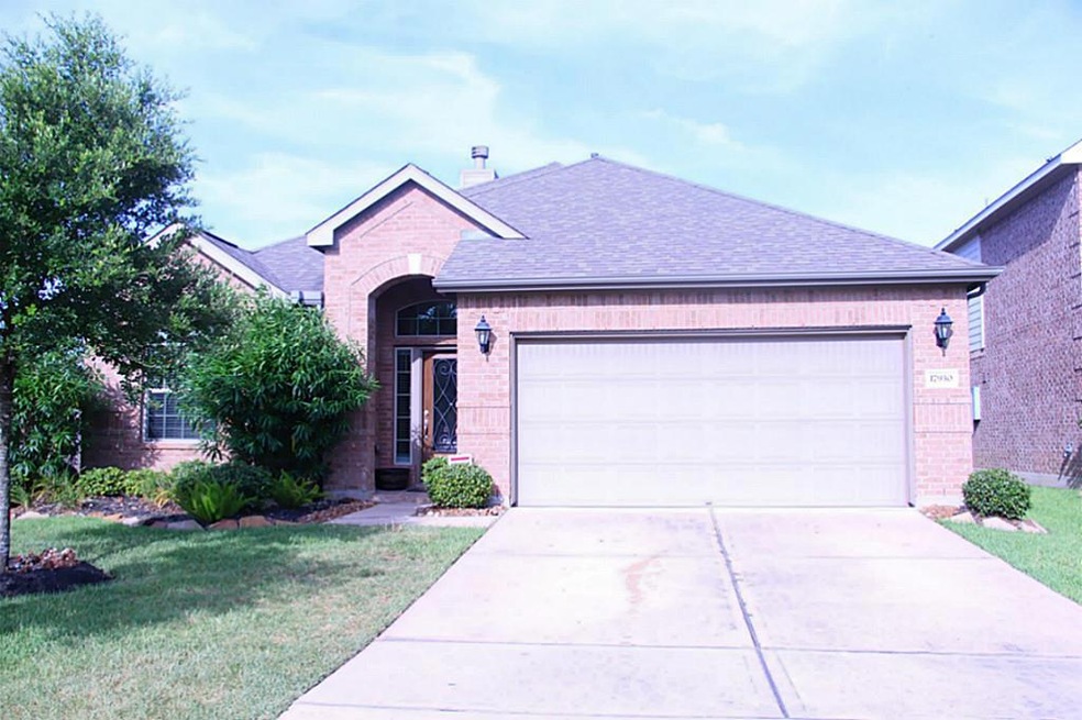 2 Car garage with spacious driveway