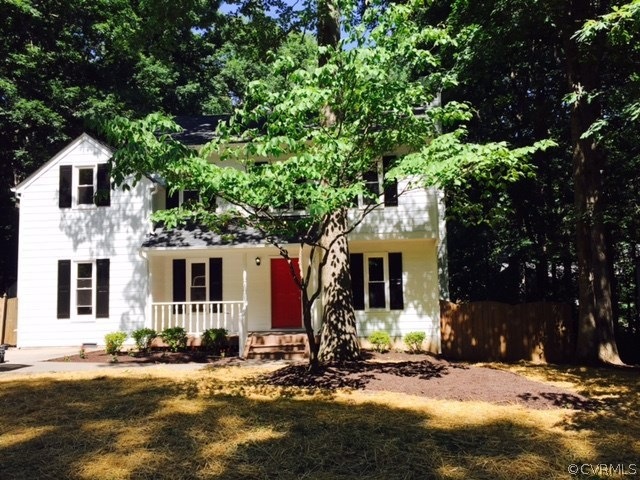 Exterior features front porch, concrete driveway a
