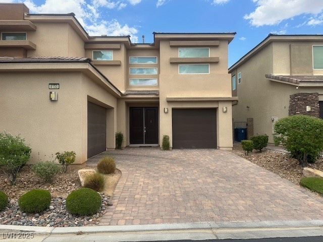 Townhome / multi-family property with stucco sidin