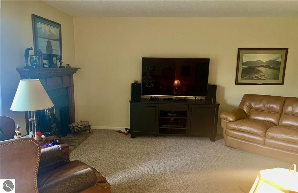 Large family room with a gas burning fireplace