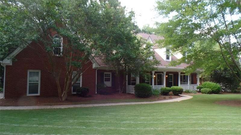 FRONT OF HOUSE.  SIDE ENTRY GARAGE ON LEFT