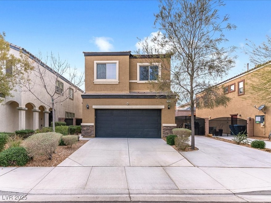 View of front of home featuring stone siding, conc