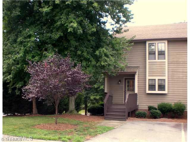 Exterior Front. Mature landscaping and well maintained grounds set this townhome community apart from all the rest.