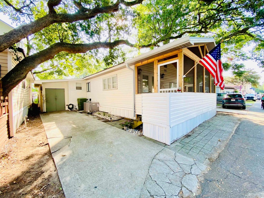 View of driveway and side of home
