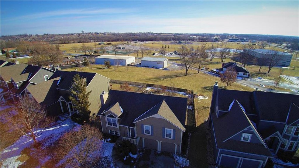 321 Mulberry Dr, Raymore, MO 64083 - photo 1