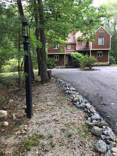 Private, wooded, nicely paved driveway.