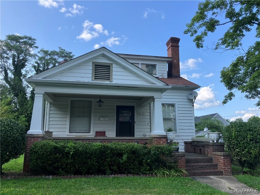 View of front of property with covered porch