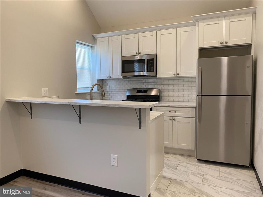 6133 Macbeth Dr unit 2, Baltimore, MD 21239 - photo 1