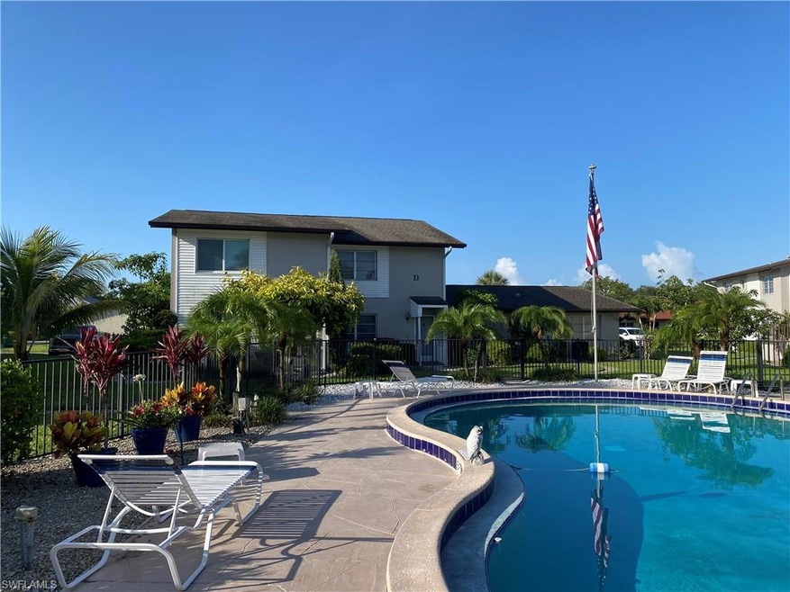 Community pool featuring a patio area