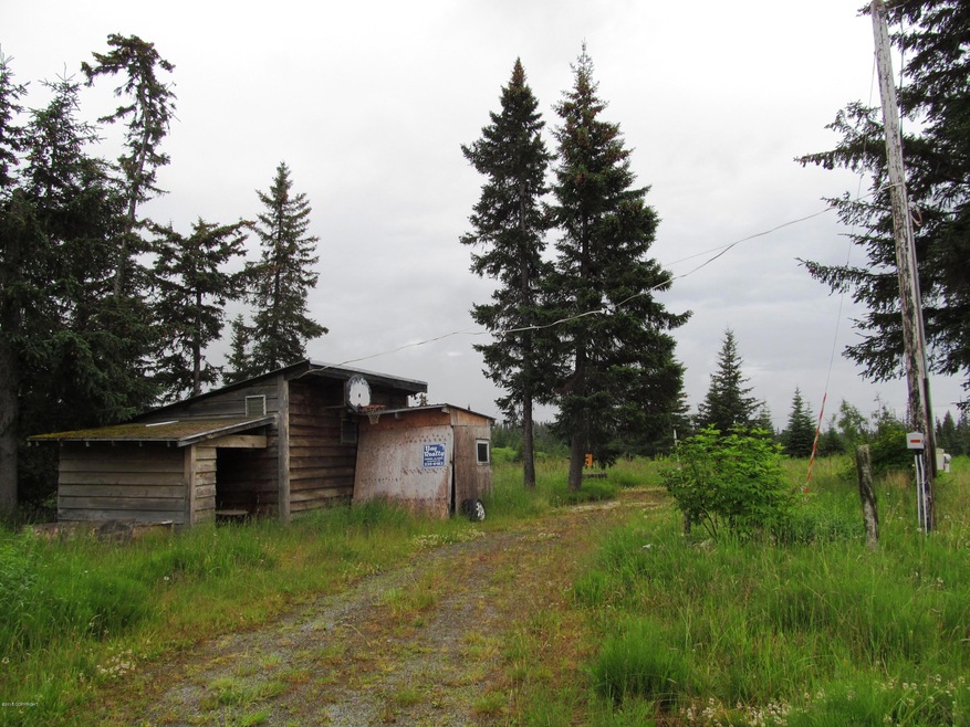 Nice lot with shed, power, well & septic