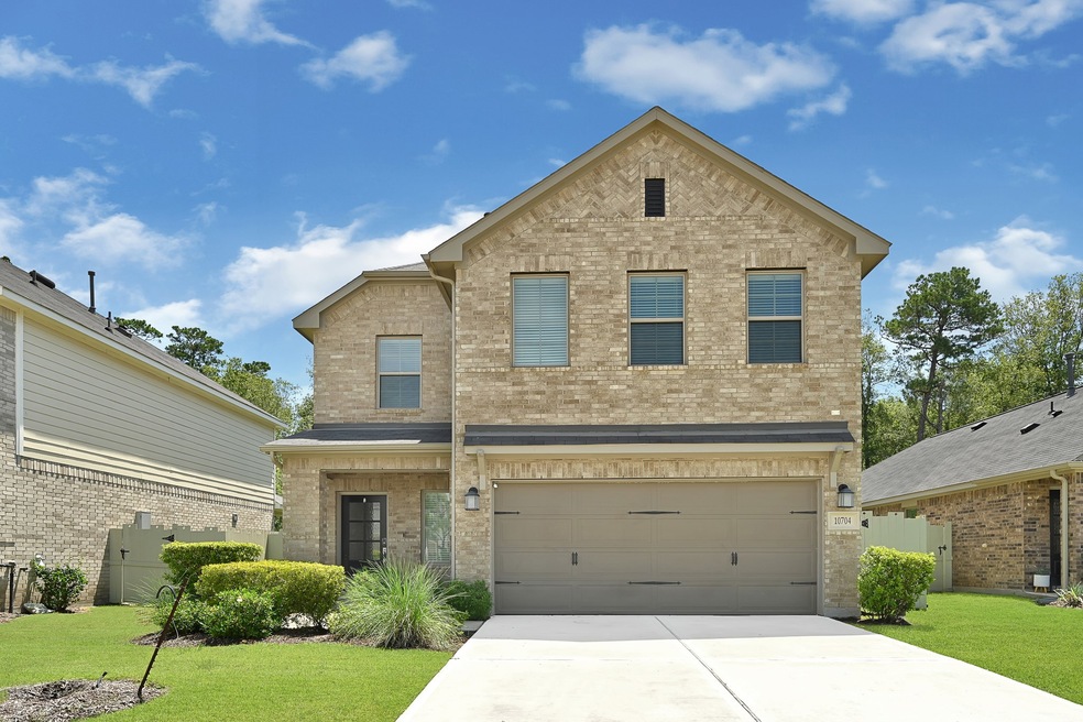 10704 Wild Chives, Conroe, TX 77385 - photo 1