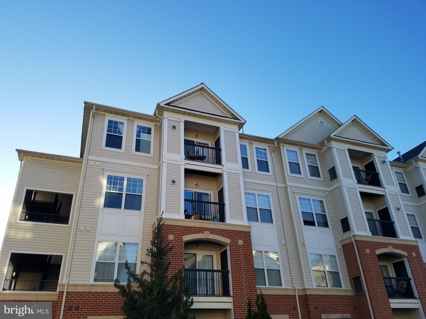 11350 Aristotle Dr unit 7-402, Fairfax, VA 22030 - photo 1