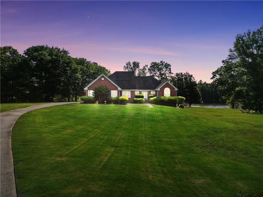Traditional-style house with a front yard