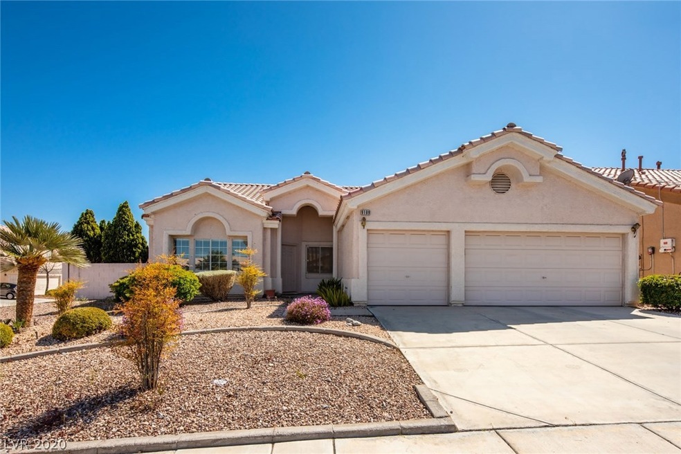 Entrance to home on lovely corner lot.