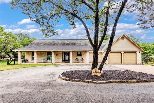 Welcome Home to a 13104 Wells Fargo Trail, ATX! Enjoy your circular driveway and front covered porch.