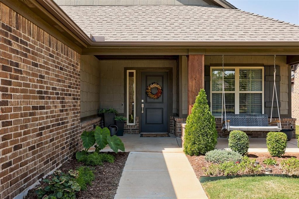 View of exterior entry featuring a porch