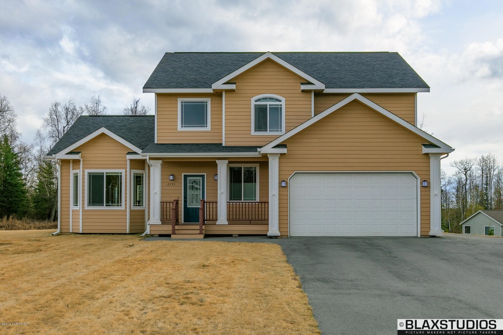 Stately presentation on wide 1 acre lot