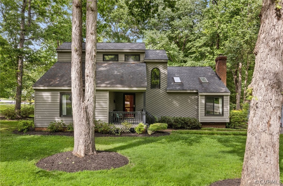 View of front of property with a front yard