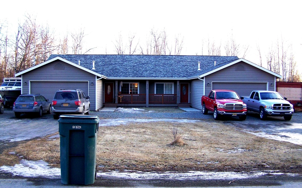 Nifty ranch style duplex with garages