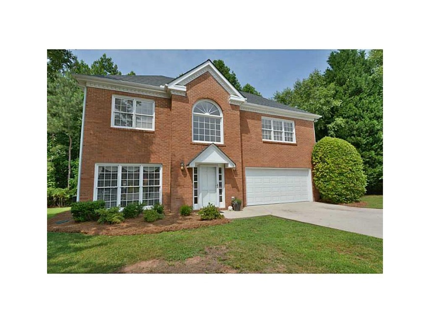 Exterior Front. Brick beauty in quiet cul-de-sac l