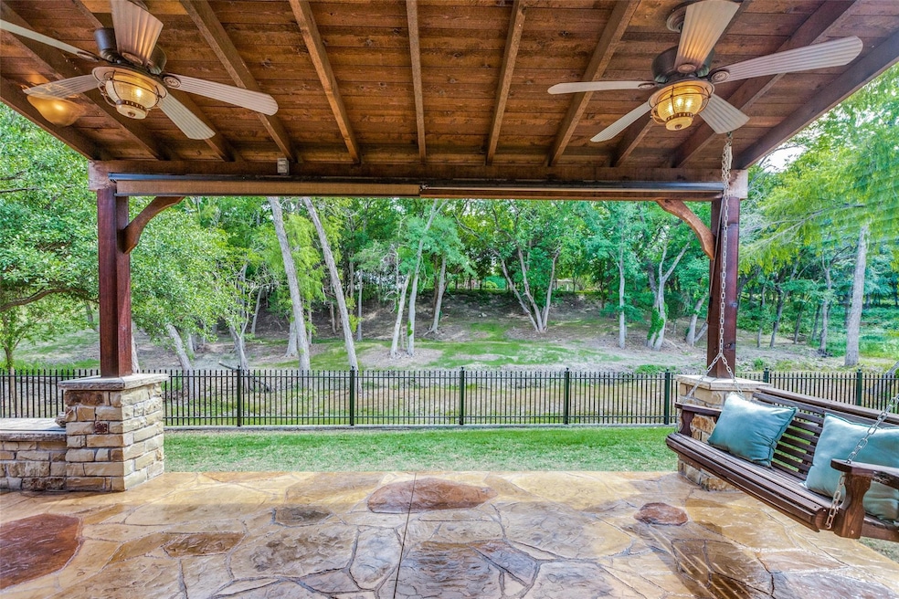 What a spring view! Stamped concrete covered patio