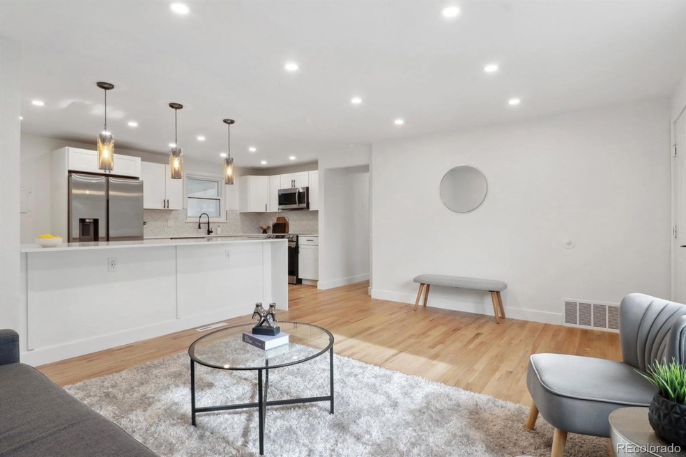 348 S Racine St, Aurora, CO 80012 - photo 1