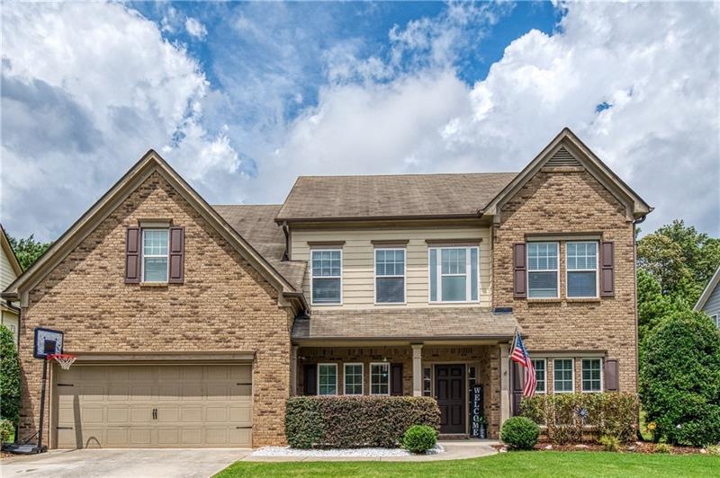 Stunning brick/concrete sided home situated on a g
